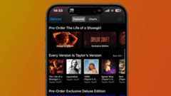 An iPhone showing the iTunes homepage with Taylor Swift's new album, The Life of a Showgirl, for pre-order