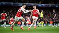 Leandro Trossard of Arsenal celebrates with teammate Kai Havertz after scoring his team's second goal during the UEFA Champions League quarter-final first leg match between Arsenal FC and FC Bayern München at Emirates Stadium on April 09, 2024 in London, England. 