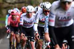 LIEGE BELGIUM APRIL 24 EDITORS NOTE Alternate crop LR Tadej Pogacar of Slovenia and UAE Team Emirates and Mathieu van der Poel of The Netherlands and Team Alpecin Deceuninck compete during the 110th Liege Bastogne Liege 2024 Mens Elite a 2545km one day race from Liege to UCIWT on April 24 2024 in Liege Belgium Photo by Dario BelingheriGetty Images