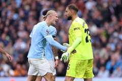 Gianluigi Donnarumma of Manchester City is congratulated by Erling Haaland after making a save during the Premier League match between Manchester City and Manchester United at Etihad Stadium on September 14, 2025 in Manchester, England.