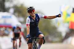 KIGALI, RWANDA - SEPTEMBER 25: Celia Gery of Team France celebrates at finish line as gold medal winner during the 98th UCI Cycling World Championships Kigali 2025 - Women Under 23 Road Race a 119,3 km one day race from Kigali to Kigali on September 25, 2025 in Kigali, Rwanda. (Photo by Dario Belingheri/Getty Images)