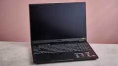 ASUS TUF Gaming A16 (2025) open on desk with pink background