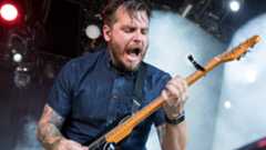 Dustin Kensrue of Thrice onstage in 2017