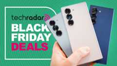 A silver, white, and blue Z Fold 7 being held by a hand