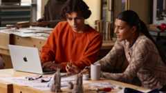 Someone working on an Apple MacBook Pro M5