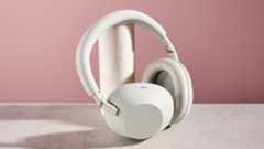 Sony WH-1000XM6 leaning on pole