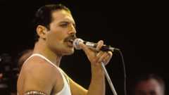Freddie Mercury singing onstage at Live Aid