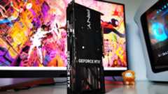 Nvidia GeForce RTX 4060 Ti sitting vertically on white desk