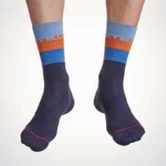Male cyclist wearing the Castelli Blocco 15 cycling socks