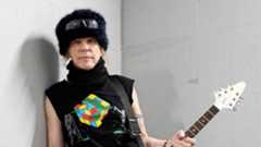 Michael Schenker holding a Flying V