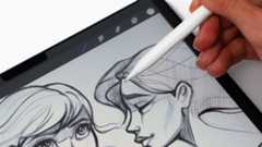 Rock, Paper, Pencil iPad accessory; a person draws on an ipad with a stylus