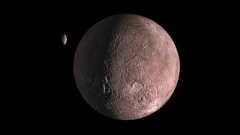 A small reddish rocky planet is seen in the darkness of space with a smaller planet-looking object nearby