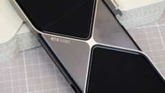 An Nvidia GeForce RTX 5080 leaning against its retail packaging with the RTX 5080 logo visible