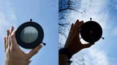 iOptron 80mm white light solar telescope filter comparison held up into the sky