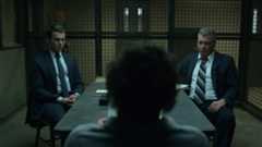 Jonathan Groff (as Holden Ford) and Holt McCallany (as Bill Tench) in an interrogation scene from Mindhunter