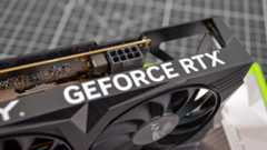 A PNY GeForce RTX 4060 Verto on a table with its retail box