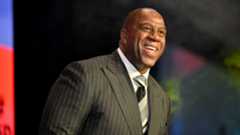 How has Magic Johnson survived with HIV