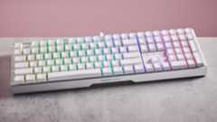 Front of Cherry XTRFY MX 3.1 on desk on with pink background