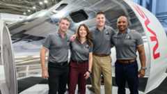 The Artemis 2 crew poses in front of an Orion simulator Jan. 23, 2026 at NASA's Johnson Space Center in Houston. From left: Reid Wiseman, Christina Koch, Jeremy Hansen and Victor Glover.