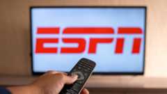ESPN logo on TV with remote