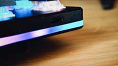 A black Drop CTRL V2 keyboard on a wooden desk