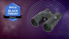 A pair of Celestron Nature DX ED 8x42 binoculars in front of a space background.