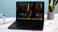 A MacBook Pro 14 sitting on a desk