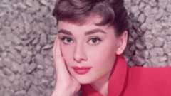 audrey hepburn on a gray background
