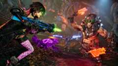 Borderlands 4 respec: Vex running towards a large Ripper while firing a corrosive weapon. Vex&#039;s summon Trouble and Rafa are also running towards the enemy in the background.