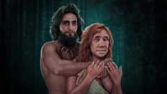 Illustration of an early modern man embracing a Neanderthal woman. They appear to be in a forest at night. The moonlight is shining through the trees just behind them