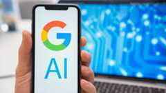 Google AI on phone with laptop in background