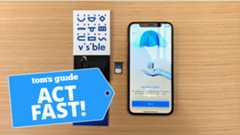 Visible welcome kit shown next to an iPhone