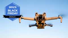 A DJI Mini 3 drone in the sky, next to a Space Black Friday deals badge. 