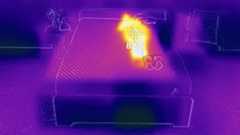 A picture of the Siena Memory Foam Mattress taken using a thermal imaging camera. This screenshot is from 9 minutes into the testing period, when our readings showed the temperature at its highest. In the image, our tester Ruth Jones lies on the right side of the mattress and she shows on the thermal imaging camera as a bright white / yellow shape. The rest of the mattress is cooler in comparison and shows up purple. A crosshair is placed in the center of the body, displaying a temperature reading of 82.3°F.