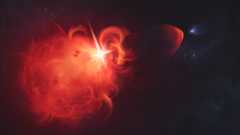 A glowing ball of red and white light showing a star, with part of this light being ejected into the darkness of space