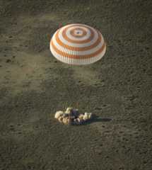 A Soyuz TMA-11M space capsule lands with Expedition 39 Commander Koichi Wakata of the Japan Aerospace Exploration Agency (JAXA), Soyuz Commander Mikhail Tyurin of Roscosmos, and Flight Engineer Rick Mastracchio of NASA near the town of Zhezkazgan, Kazakhstan on May 14, 2014.