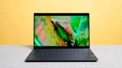 Dell XPS 13 (2024) on a testing mat next to a yellow wall