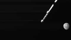 a grey crater-marked planet on an empty black background