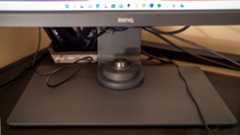 A close up image of the BenQ SW321C hotkey puck