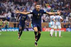 Kylian Mbappe celebrates after scoring his second goal for France against Argentina in the 2022 World Cup final.