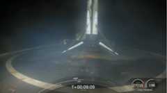 A SpaceX Falcon 9 rocket stands atop the drone landing ship Just Read The Instructions after a successful landing following the launch of the CRS-24 Dragon cargo ship for NASA from Pad 39A of the Kennedy Space Center in Florida on Dec. 21, 2021.