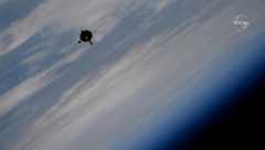 The Soyuz MS-19 spacecraft carrying Russian actress Yulia Peresild, producer-director Klim Shipenko and cosmonaut Anton Shklaperov approaches the International Space Station on Oct. 5, 2021 in this still from station cameras captured during docking operations.
