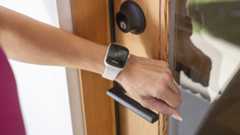 Level Touch Plus smart lock in use with an Apple Watch