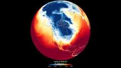 A heat map of the Earth's northern hemisphere, with a dark blue shape over the US showing a severe winter storm