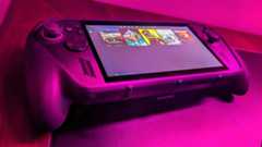 Xbox Ally X illuminated by a pink glow. Playnite game launcher is displayed on the screen. 