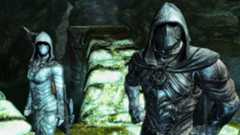 Two Skyrim thieves in leather nightingale armor regarding camera.