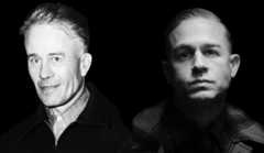 Two men in black-and-white portraits against a dark background, each facing forward with short hair and collared jackets.