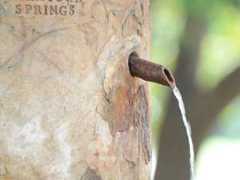 close-up view of saratoga springs etching on the side of congress spring
