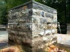 water running out of hayes well spring into the ground