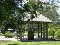 covered pavilion protecting geyser spring